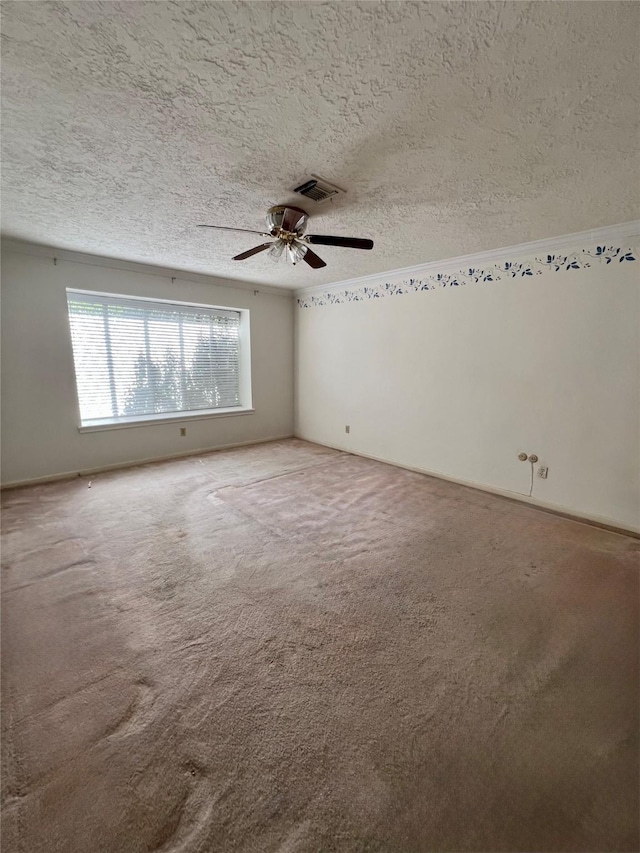 16418 York Minster Dr, Spring, TX 77379 - carpeted empty room featuring a textured ceiling and ceiling fan