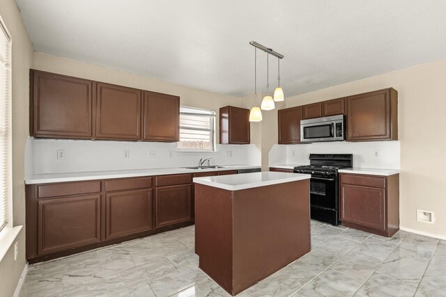 7931 Raven Creek Ln, Cypress, TX 77433 - kitchen with stainless steel microwave, black range with gas cooktop, marble finish floor, and a sink