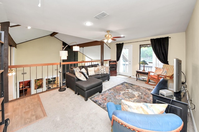 living room featuring lofted ceiling, visible vents, ceiling fan, recessed lighting, and wood finished floors