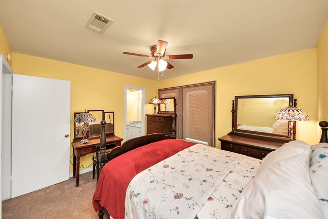 200 Old Bridge Lk, Houston, TX 77069 - carpeted bedroom with ceiling fan, ensuite bathroom, and visible vents