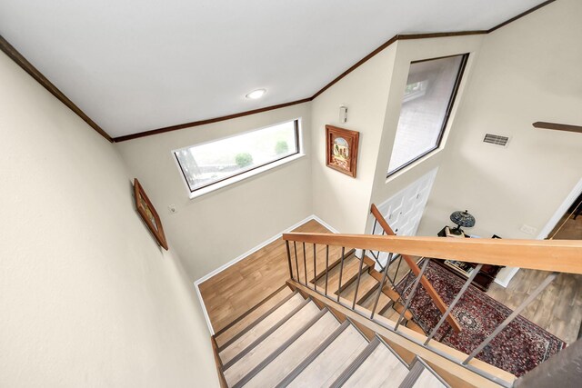 200 Old Bridge Lk, Houston, TX 77069 - staircase with visible vents, a skylight, wood finished floors, baseboards, and ornamental molding