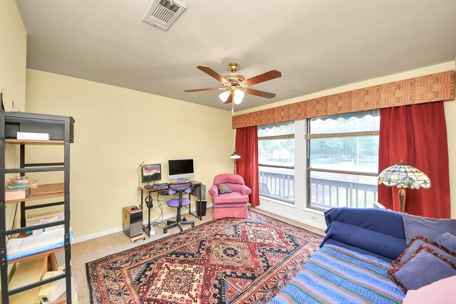 200 Old Bridge Lk, Houston, TX 77069 - carpeted living room with visible vents, a ceiling fan, and baseboards