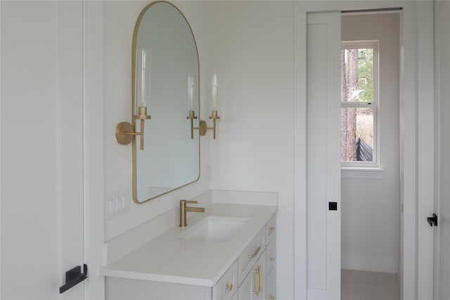 100 Mahalo Ct, Bastrop, TX 78602 - bathroom with vanity and baseboards