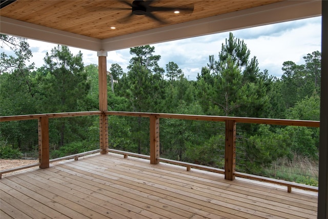 100 Mahalo Ct, Bastrop, TX 78602 - deck with ceiling fan and a forest view