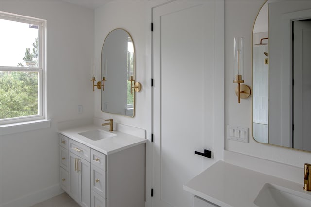 100 Mahalo Ct, Bastrop, TX 78602 - bathroom featuring vanity and baseboards