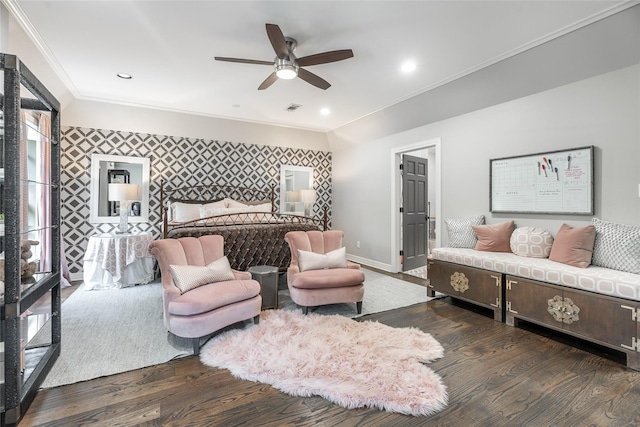 11519 Shadow Way St, Houston, TX 77024 - bedroom featuring crown molding, an accent wall, baseboards, dark wood-type flooring, and visible vents