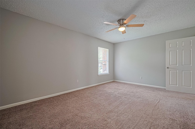 23931 Griffin House Ln, Katy, TX 77493 - carpeted empty room featuring baseboards, a ceiling fan, and a textured ceiling