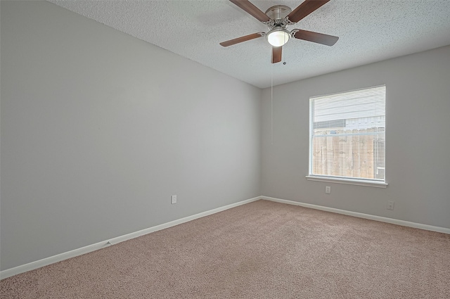 23931 Griffin House Ln, Katy, TX 77493 - unfurnished room featuring a textured ceiling, a ceiling fan, light carpet, and baseboards