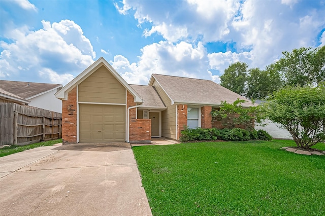 23931 Griffin House Ln, Katy, TX 77493 - single story home featuring brick siding, fence, driveway, a front yard, and an attached garage