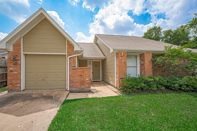 23931 Griffin House Ln, Katy, TX 77493 - ranch-style house with brick siding, a shingled roof, a garage, a front lawn, and concrete driveway