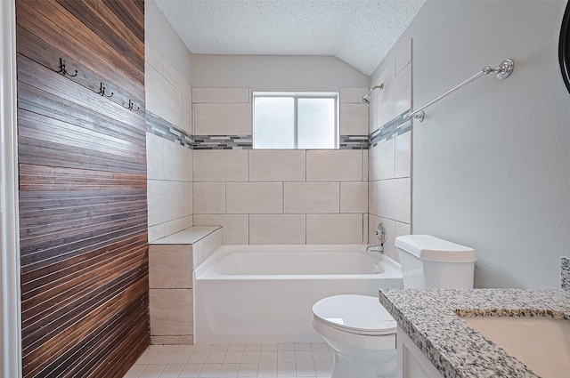23931 Griffin House Ln, Katy, TX 77493 - bathroom featuring a textured ceiling, toilet, vaulted ceiling, shower / bath combination, and tile patterned floors
