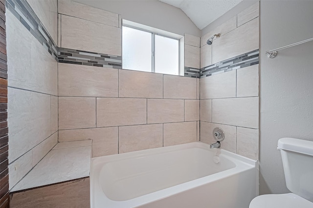 23931 Griffin House Ln, Katy, TX 77493 - full bathroom with toilet, bathtub / shower combination, and lofted ceiling