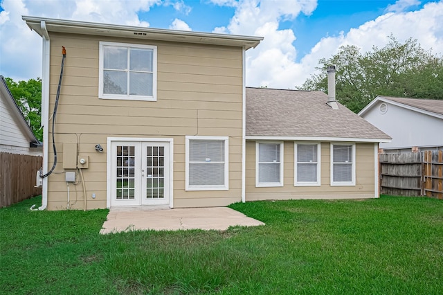 23931 Griffin House Ln, Katy, TX 77493 - back of property with fence, french doors, a yard, and a patio area