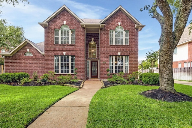 4406 Tarlton Way, Sugar Land, TX 77478 - colonial inspired home with brick siding
