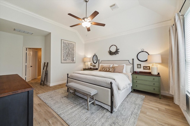 4406 Tarlton Way, Sugar Land, TX 77478 - bedroom with crown molding, multiple windows, vaulted ceiling, light wood-type flooring, and baseboards