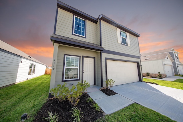 8113 Burnt Orchid Dr, Houston, TX 77016 - view of front facade featuring a garage, driveway, and a front yard