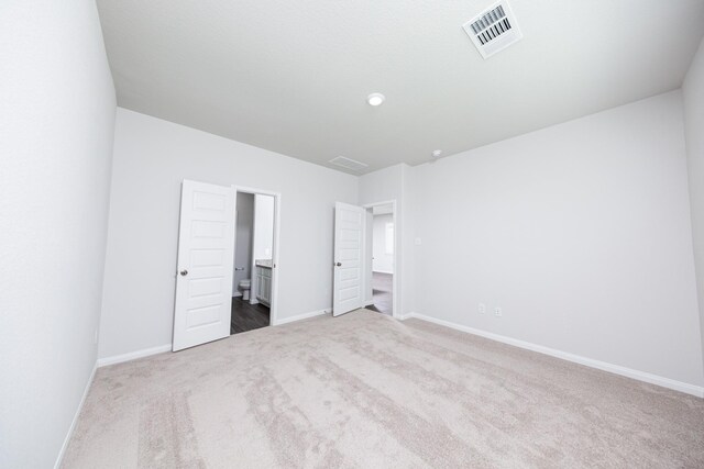 8113 Burnt Orchid Dr, Houston, TX 77016 - unfurnished bedroom with carpet floors and ensuite bathroom