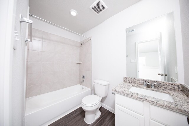 8113 Burnt Orchid Dr, Houston, TX 77016 - bathroom with wood finished floors, vanity, and shower / bath combination