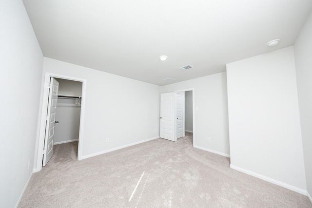 8113 Burnt Orchid Dr, Houston, TX 77016 - unfurnished bedroom with light carpet, a spacious closet, and a closet