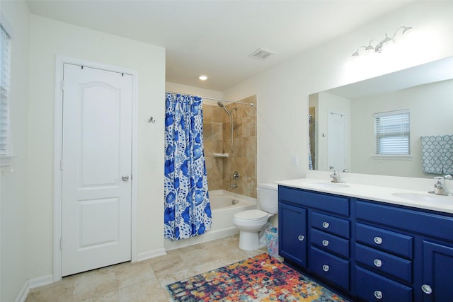 full bath with a sink, toilet, double vanity, and shower / bath combination with curtain