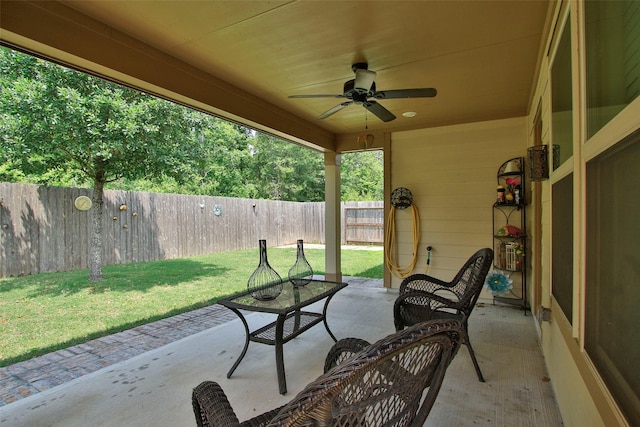 view of patio featuring a ceiling fan and a fenced backyard