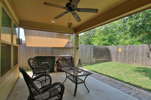 view of patio featuring a fenced backyard and ceiling fan