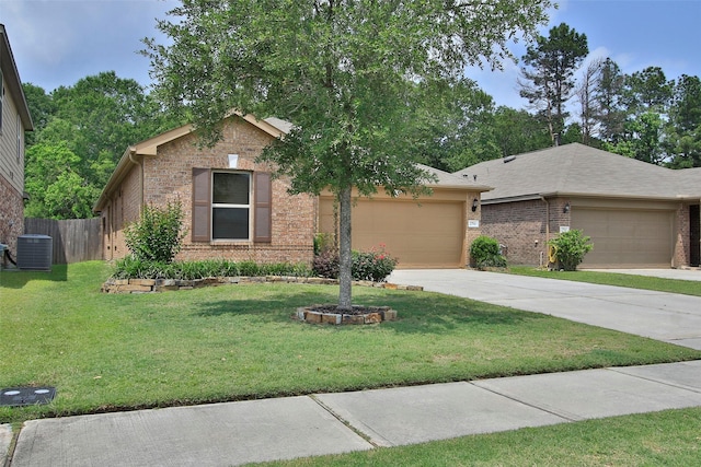 view of front of home featuring a front yard, brick siding, central AC unit, concrete driveway, and an attached garage