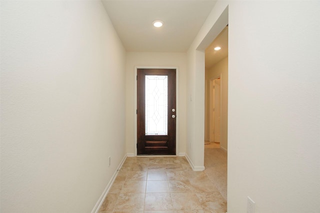 entryway featuring recessed lighting and baseboards
