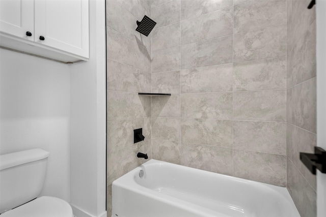 bathroom featuring toilet, bathtub / shower combination, and baseboards