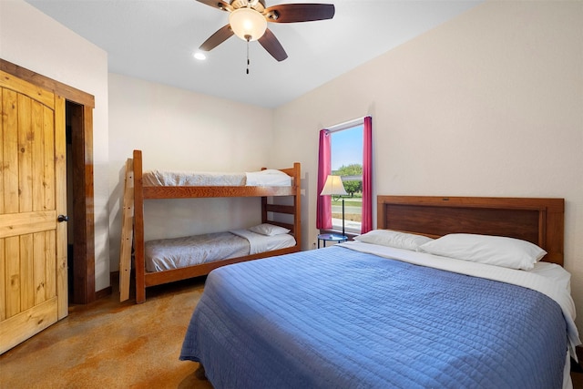 carpeted bedroom featuring ceiling fan