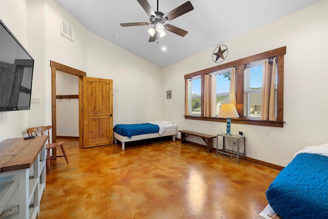 bedroom featuring concrete floors, visible vents, ceiling fan, baseboards, and vaulted ceiling