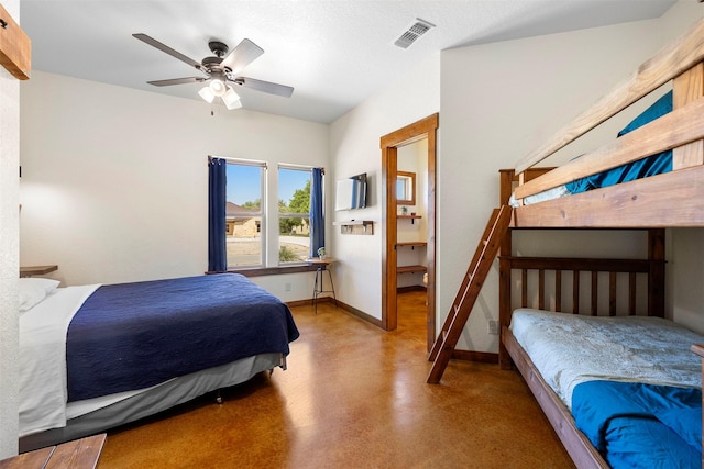 bedroom with visible vents, a ceiling fan, concrete flooring, and baseboards