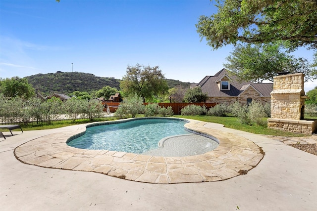 view of pool with fence, a patio area, and a fenced in pool