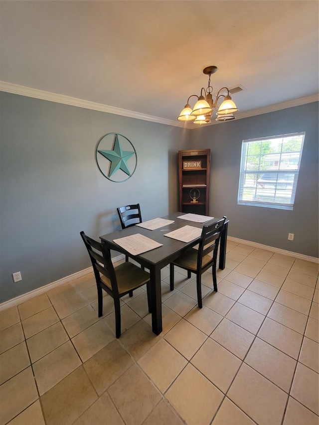 dining area with crown molding, light tile patterned flooring, and baseboards