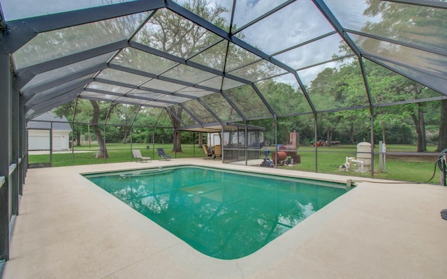 outdoor pool with a lanai, a yard, and a patio area