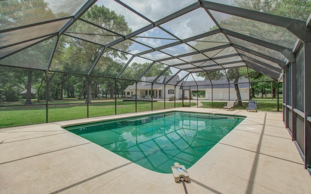 pool with a lanai, a patio, and a yard