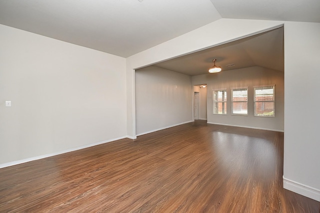 15111 Longleaf Forest Dr, Houston, TX 77090 - unfurnished room featuring baseboards, wood finished floors, and vaulted ceiling