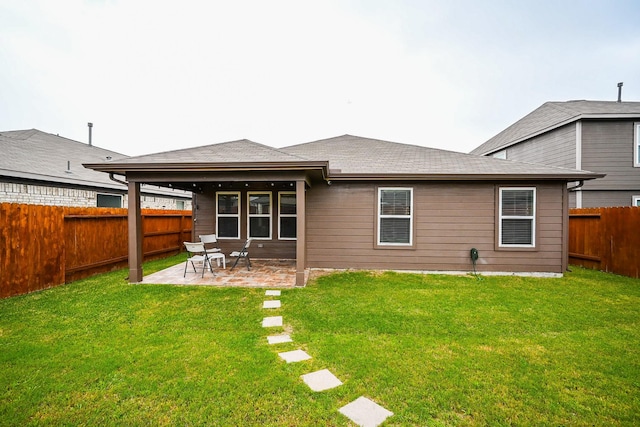 15111 Longleaf Forest Dr, Houston, TX 77090 - rear view of house featuring a lawn, a patio area, and a fenced backyard