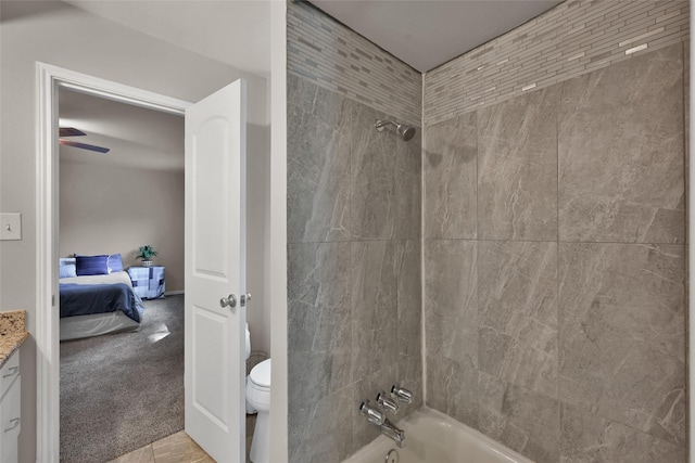 ensuite bathroom with vanity, toilet, shower / bath combination, and ensuite bath
