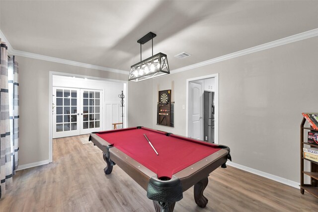 playroom featuring crown molding, visible vents, french doors, and wood finished floors