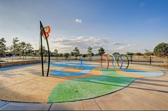 view of sport court with fence and playground community