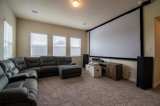 11823 Champions Forest Dr, Dayton, TX 77535 - cinema with baseboards, visible vents, and light colored carpet