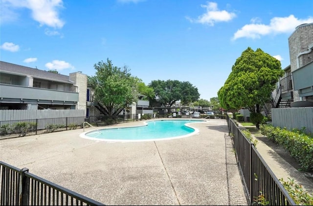 9700 Leawood Blvd Unit 308, Houston, TX 77099 - community pool with a patio