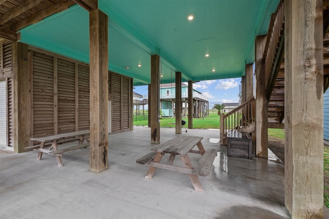 886 Sandollar, Crystal Beach, TX 77650 - view of patio / terrace featuring stairs
