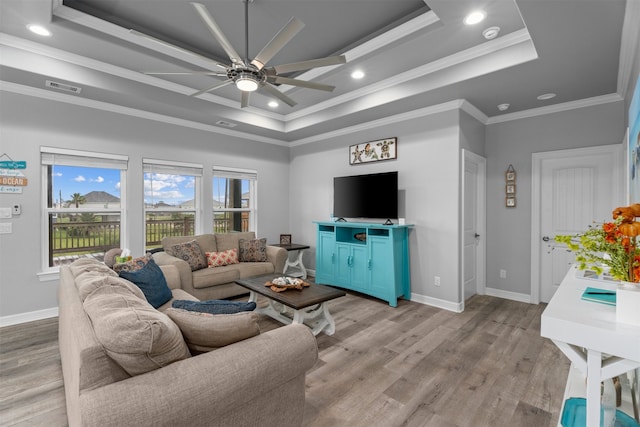 886 Sandollar, Crystal Beach, TX 77650 - living area featuring recessed lighting, light wood-style flooring, ceiling fan, visible vents, and a raised ceiling