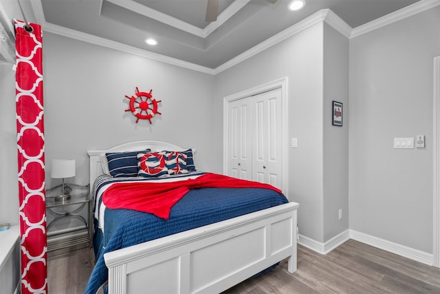 886 Sandollar, Crystal Beach, TX 77650 - bedroom with wood finished floors and crown molding