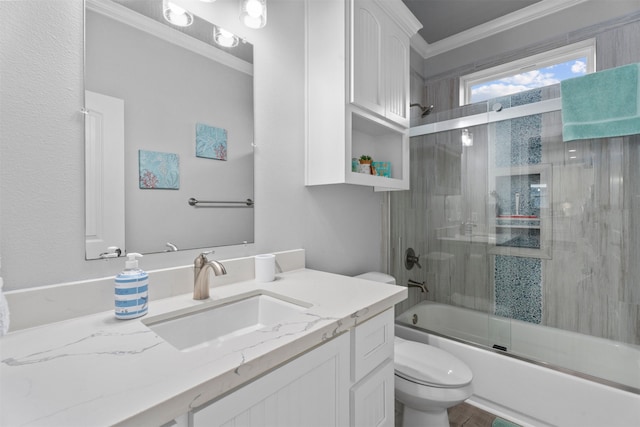 886 Sandollar, Crystal Beach, TX 77650 - bathroom with bath / shower combo with glass door, vanity, toilet, and ornamental molding