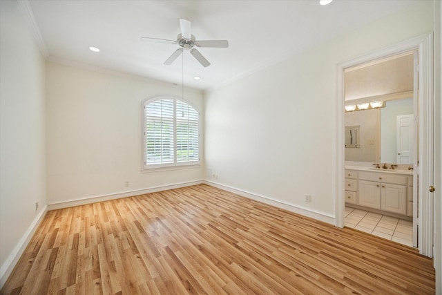 2 Wexford Ct, Piney Point Village, TX 77024 - unfurnished bedroom with light wood-style flooring, ornamental molding, baseboards, a sink, and ensuite bath