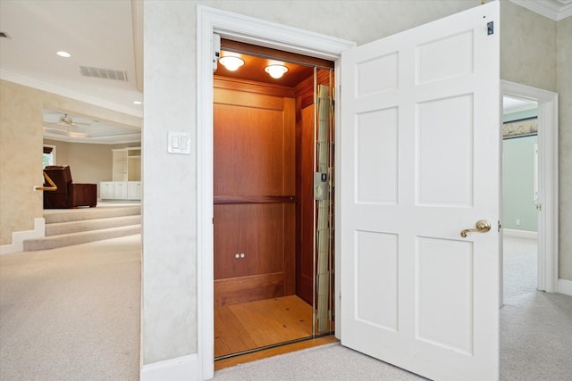 2 Wexford Ct, Piney Point Village, TX 77024 - hall with carpet flooring, crown molding, baseboards, elevator, and recessed lighting
