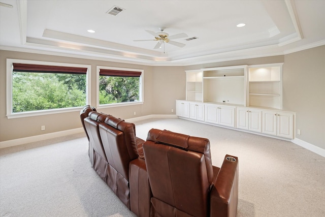 2 Wexford Ct, Piney Point Village, TX 77024 - cinema featuring a tray ceiling, light carpet, baseboards, ceiling fan, and crown molding